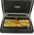 Duke Year of the Dragon gold in box 4.jpg